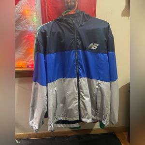 New balance rain jacket (waterproof and wind resistant)